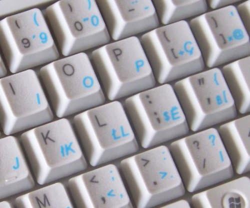 Adesivos de teclado albaneses com letras azuis em fundo transparente