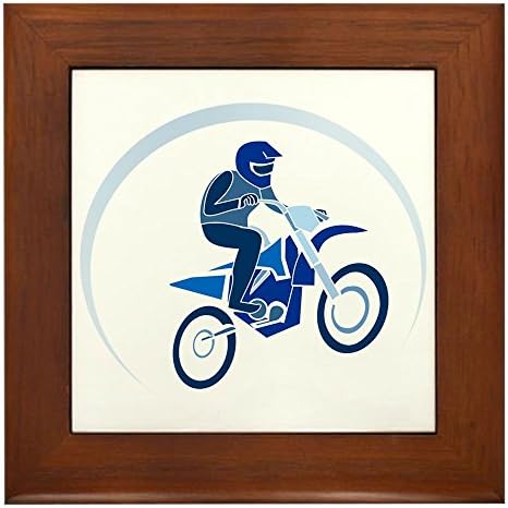 Verdadeiramente teague emoldurado Motocross MX Bike de terra voando em azul