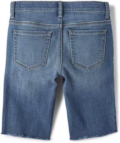 O skimmer de jeans destruído para meninas do lugar infantil