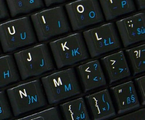 Etiquetas de teclado de netbook ingleses em inglês tcheco em fundo preto
