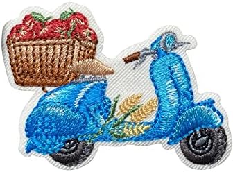 Scooter azul com cesta de maçãs - ferro bordado no patch